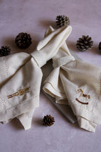 Servilletas de lino con orilla decorativa